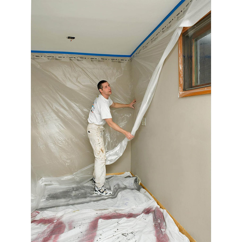 Unfolding 9 foot drop of 3M CP9 plastic to cover corner walls
