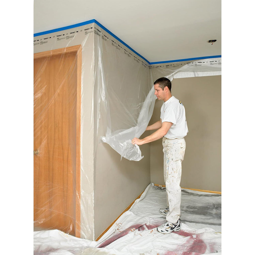 Pulling down 3M CP9 masking plastic to protect wall surface