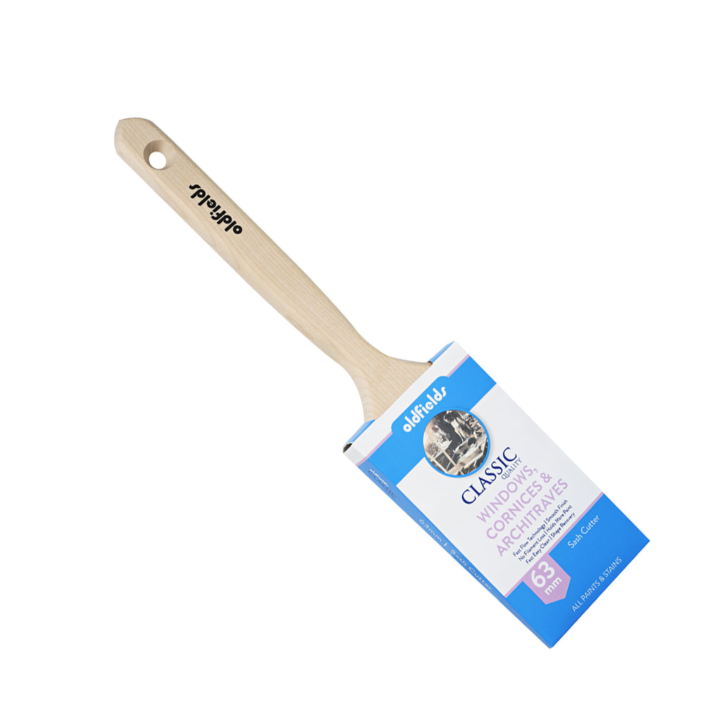 Angled view of Oldfields Classic 63mm sash cutter paint brush for windows and trim