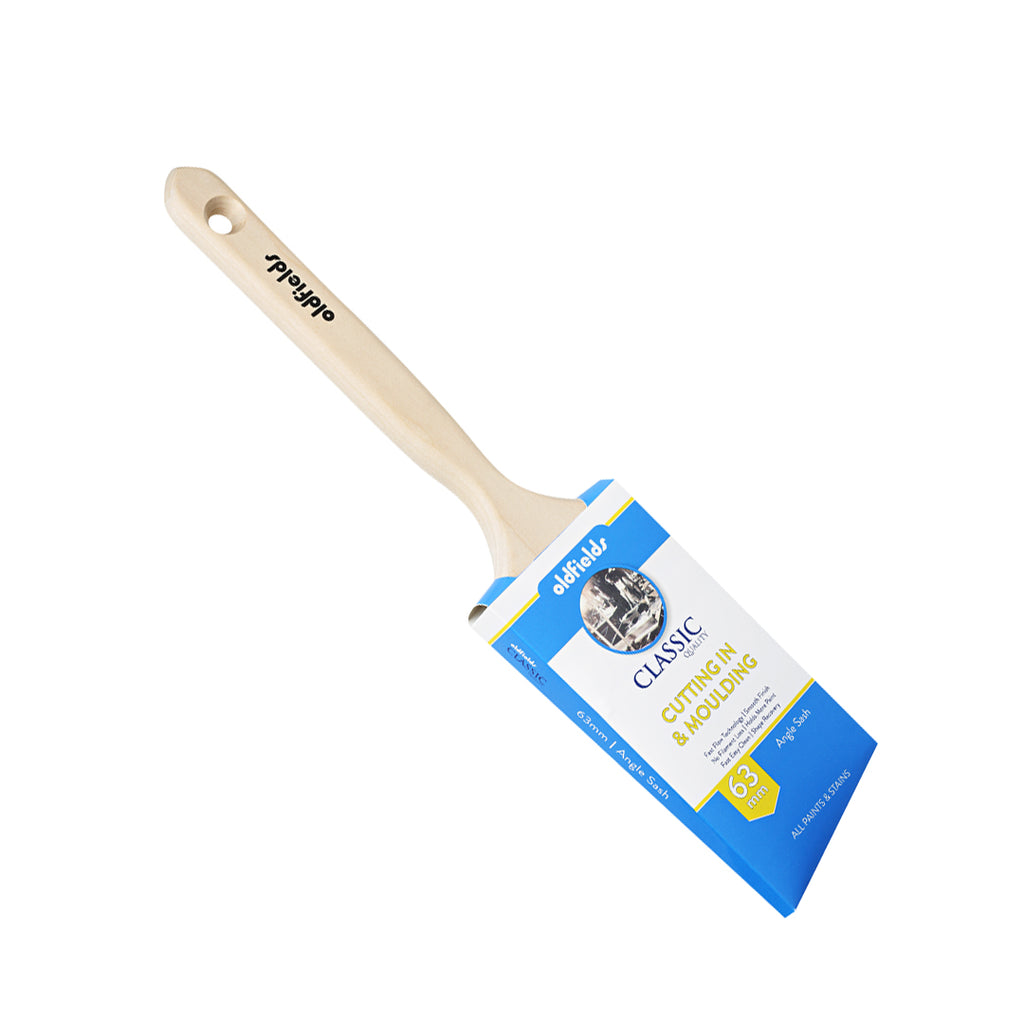 Angled view of Oldfields Classic 63mm angle sash paint brush for moulding work