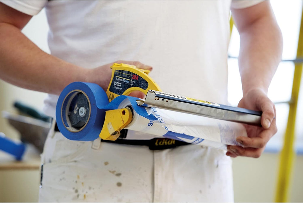 Close up of 3M M3000 dispenser with film and blue painter's tape