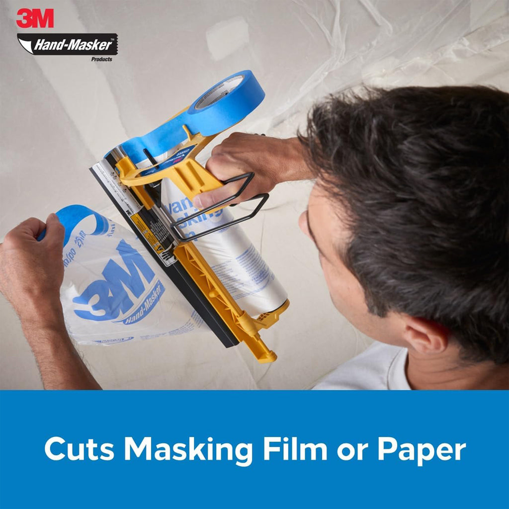 Top view of 3M Hand-Masker M3000 dispenser with 12-inch straight cut blade in action