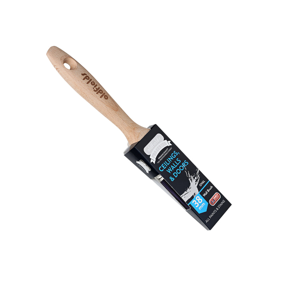 Angled view of Oldfields Pro Series 38mm oval wall brush in packaging for painting