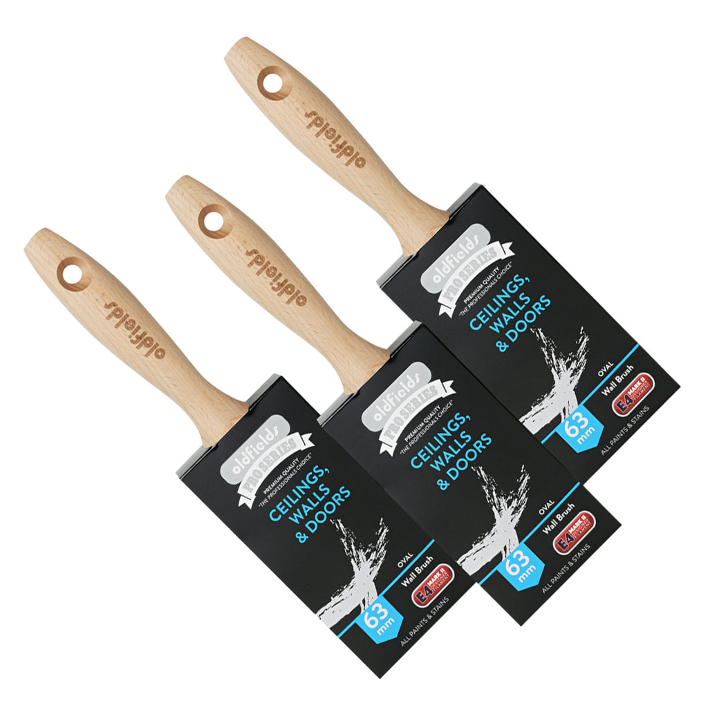 Three Oldfields Pro Series 63mm oval wall brushes displayed together for professionals