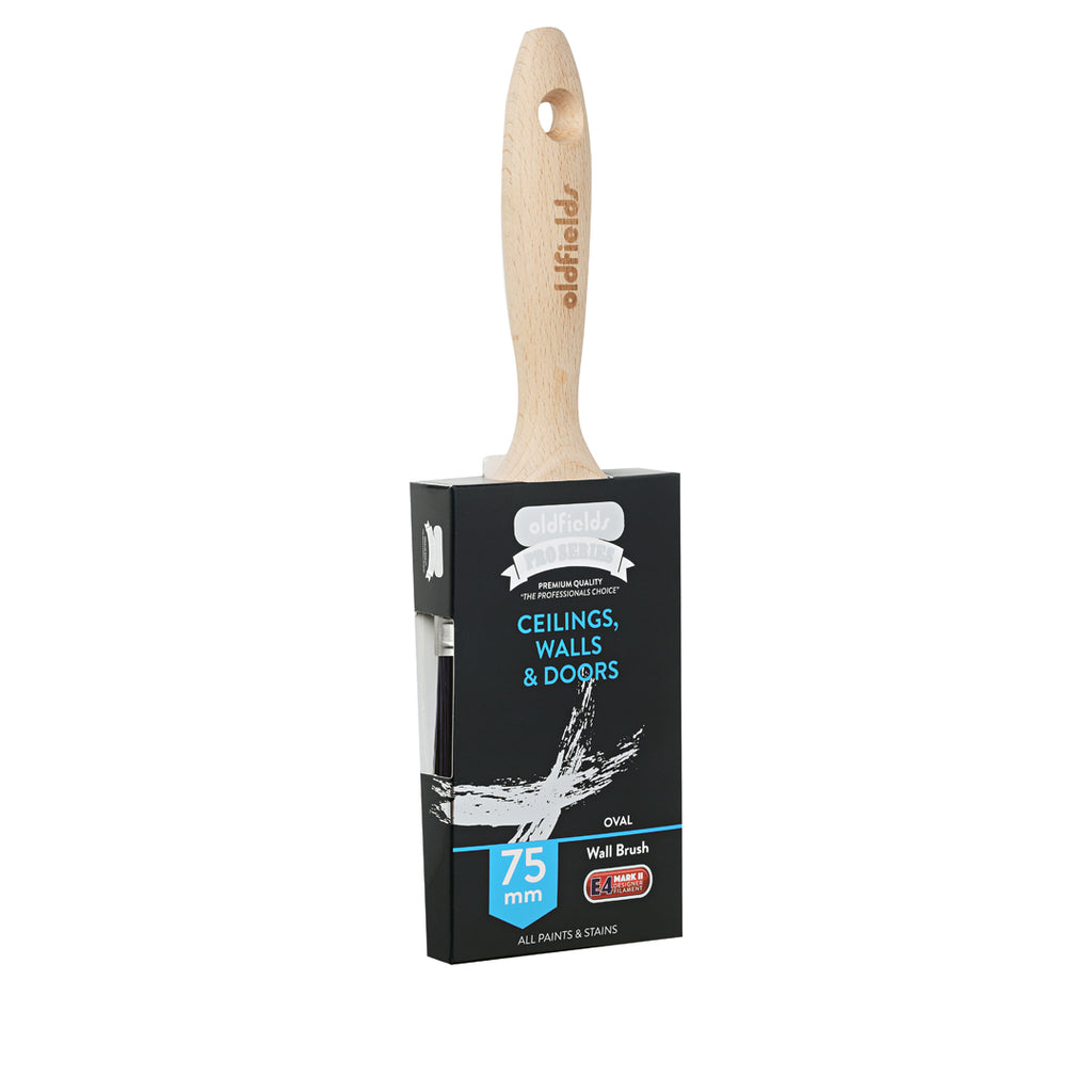 Angled view of Oldfields Pro Series 75mm oval wall brush in packaging for painting