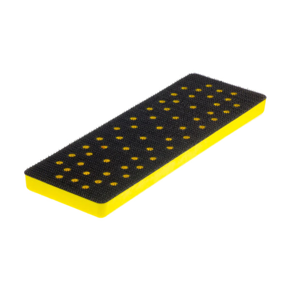 Close-up of the 48-hole Mirka DEOS backing pad for efficient dust extraction