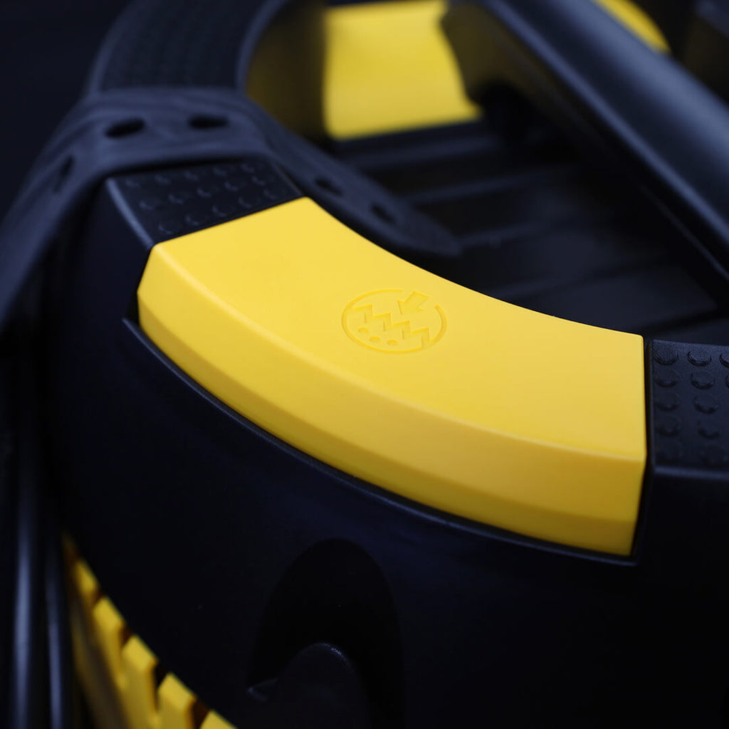 Yellow Push&Clean filter cleaning button on top of the Mirka dust extractor unit