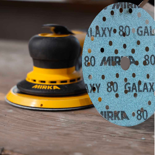 Blue 150mm Mirka Galaxy disc showing the self-sharpening ceramic grain for timber sanding